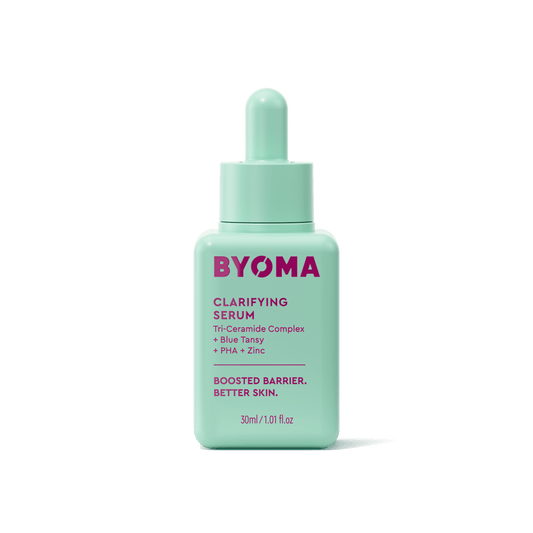 BYOMA CLARIFYING SERUM against a green background.