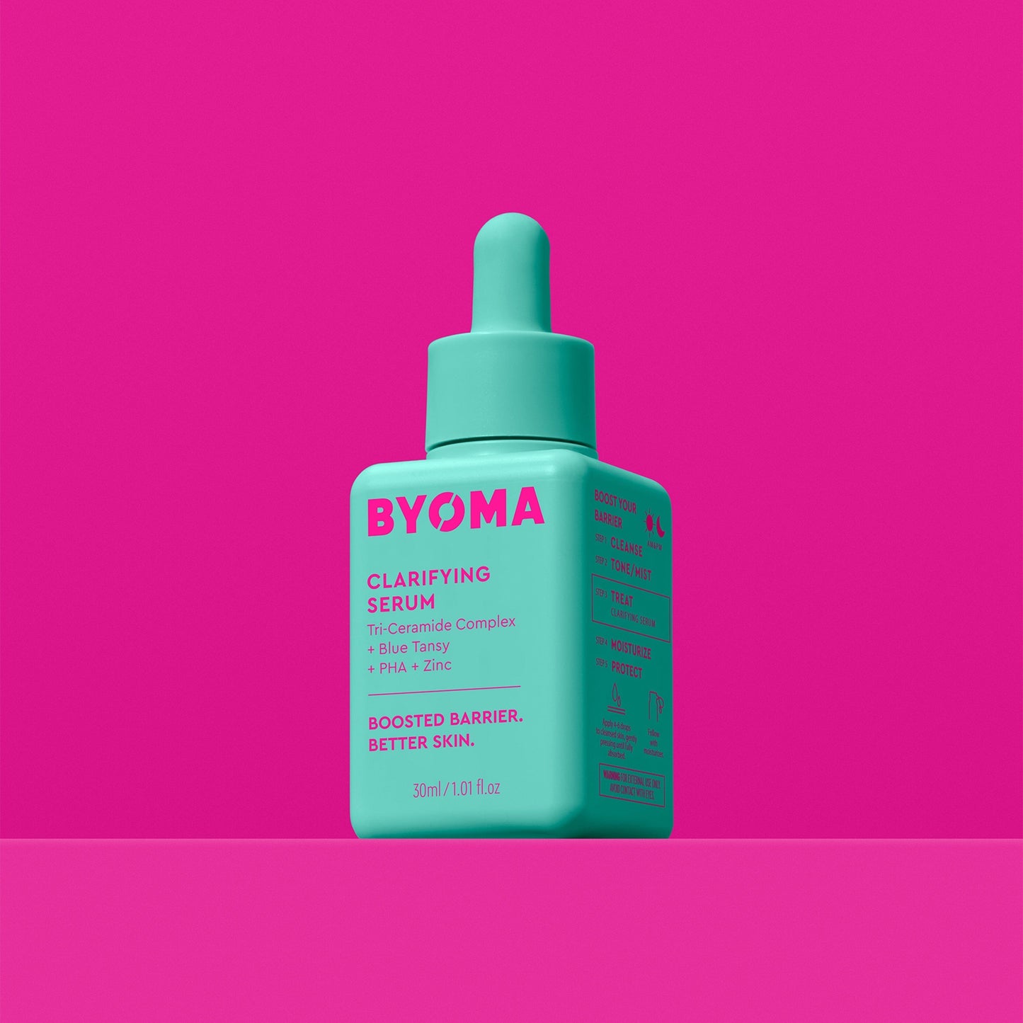 BYOMA CLARIFYING SERUM against a pink background.
