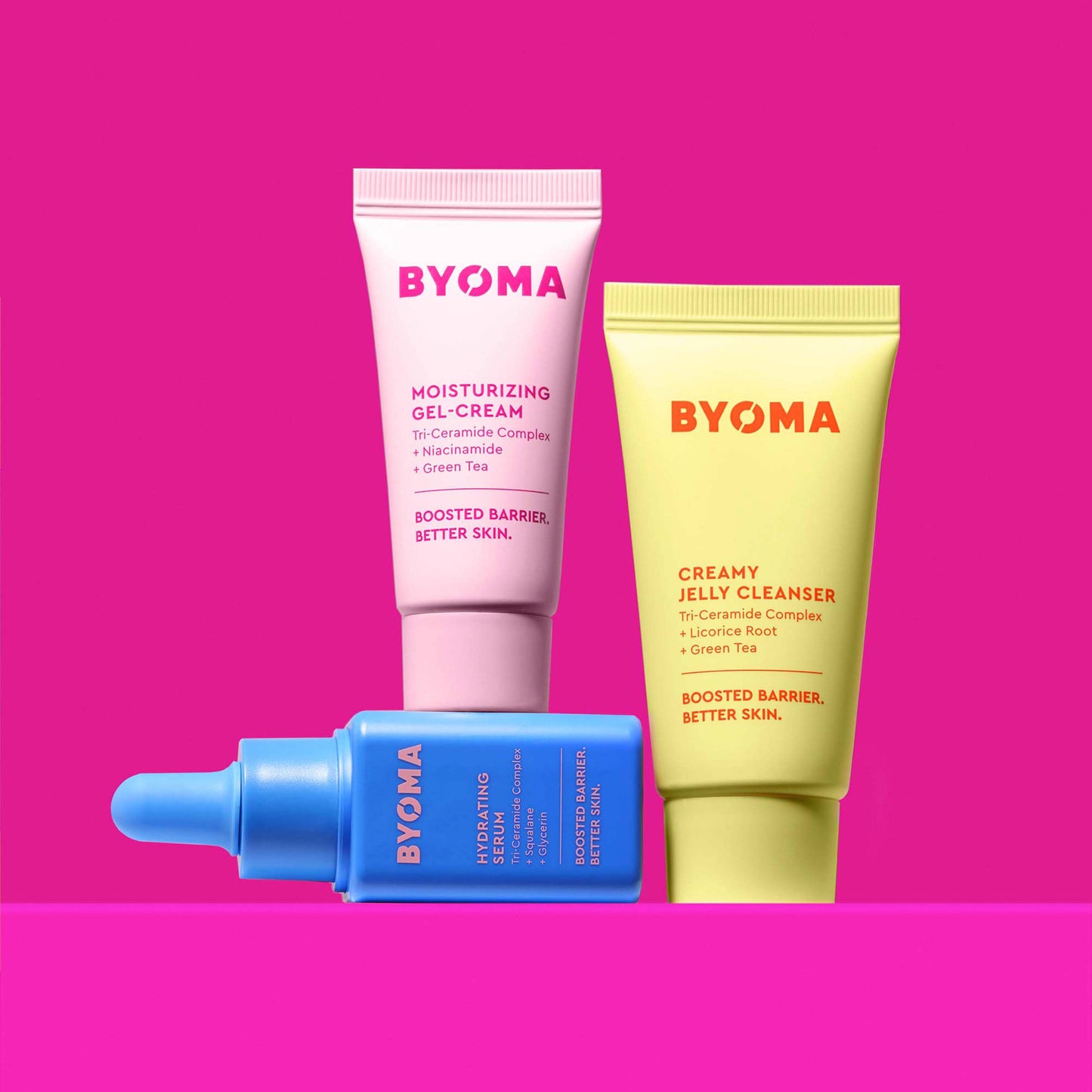 MOISTURIZING GEL-CREAM, HYDRATING SERUM and CREAMY JELLY CLEANSER stacked against a pink background.