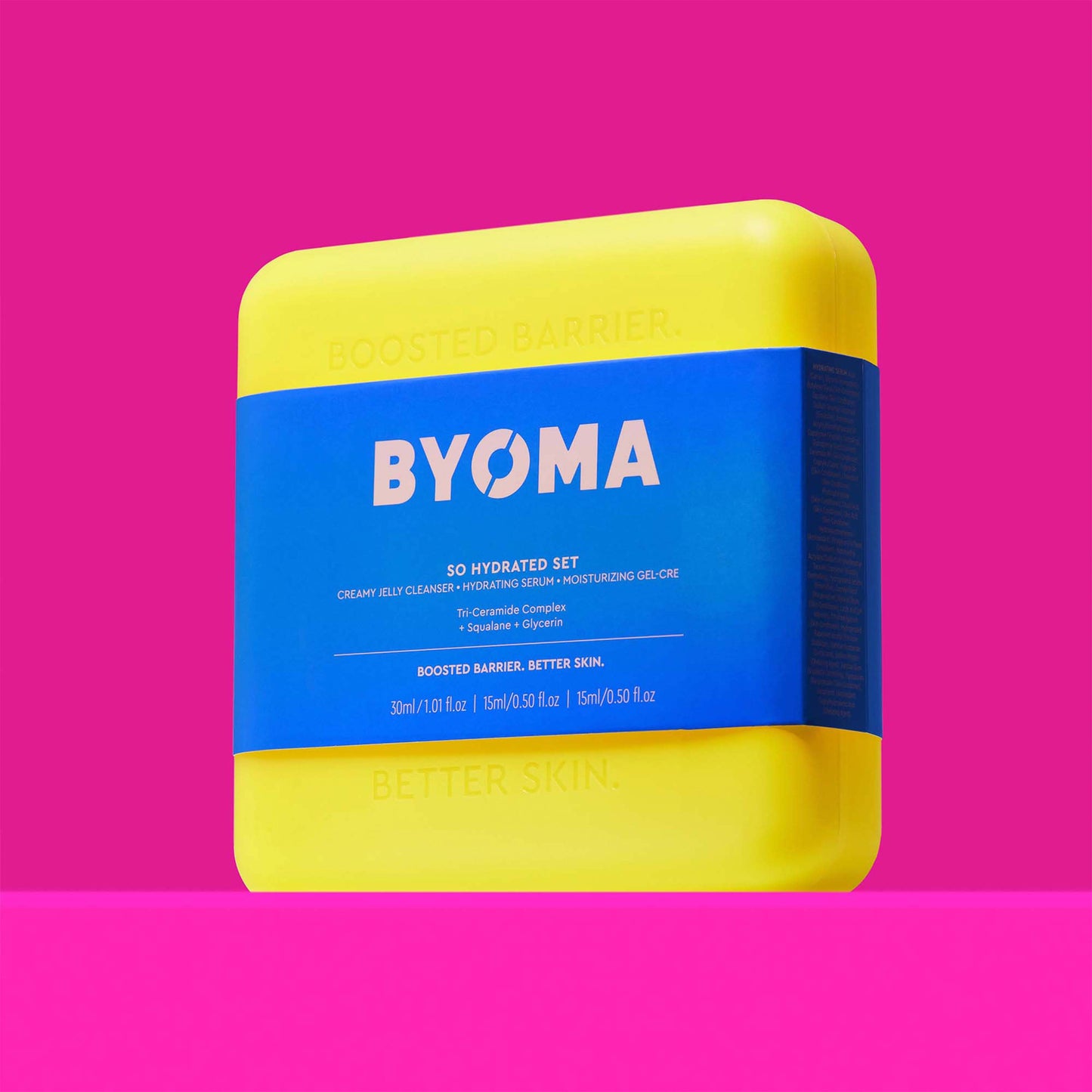 BYOMA SO HYDRATED SET kit against a pink background.