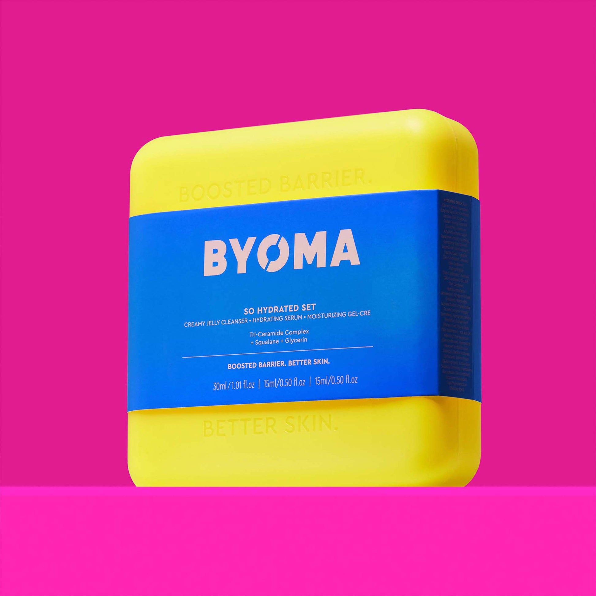 BYOMA SO HYDRATED SET kit against a pink background.