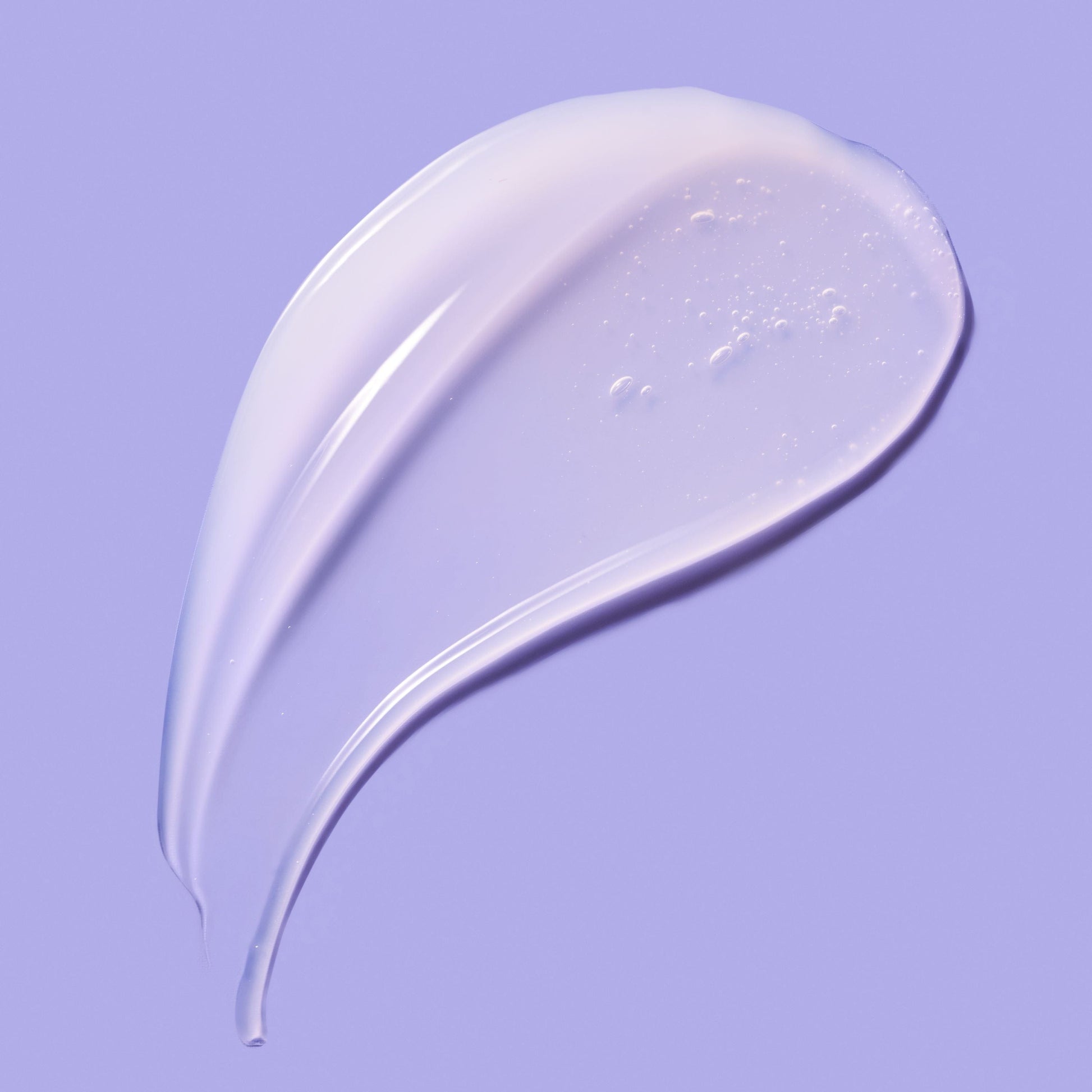 Swab of cream in a blue background.