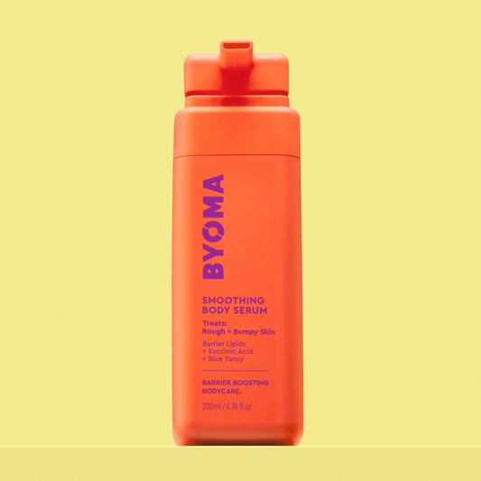 BYOMA SMOOTHING BODY SERUM against a yellow background.