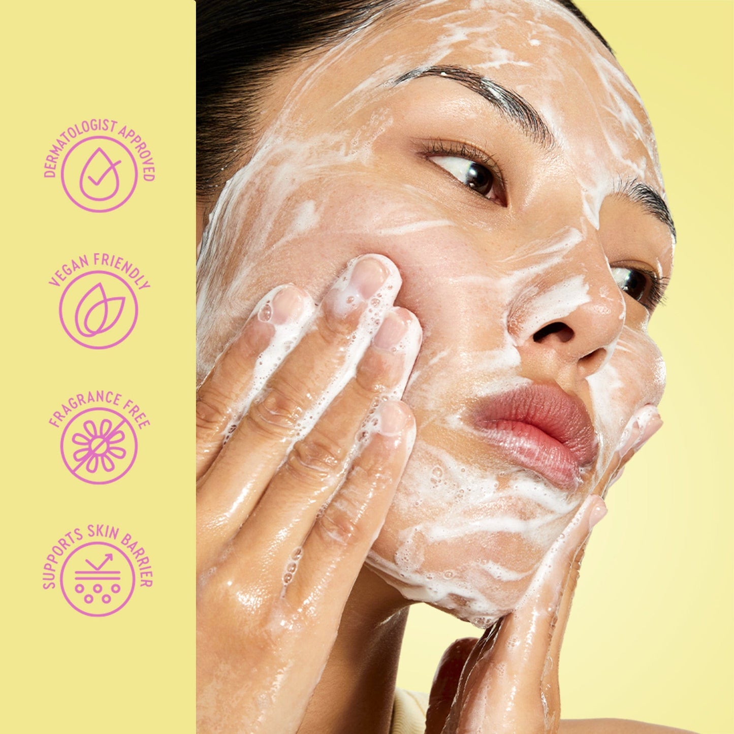 Woman applying a facial product with icons indicating dermatologist approval, vegan friendliness, fragrance-free nature, and support for skin barrier health on a yellow background.
