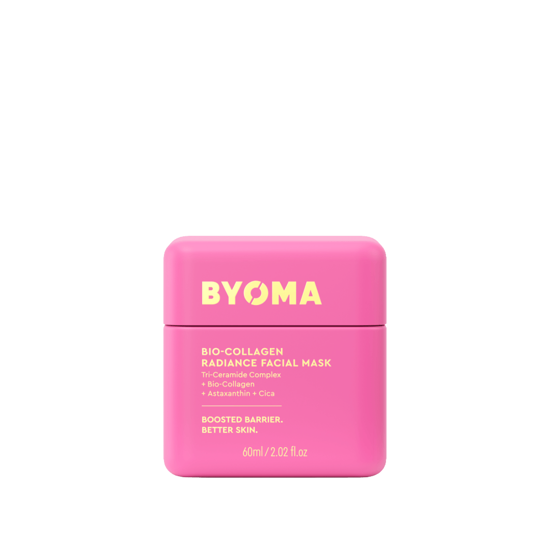Pink facial mask container with 'BYOMA' branding on a white background