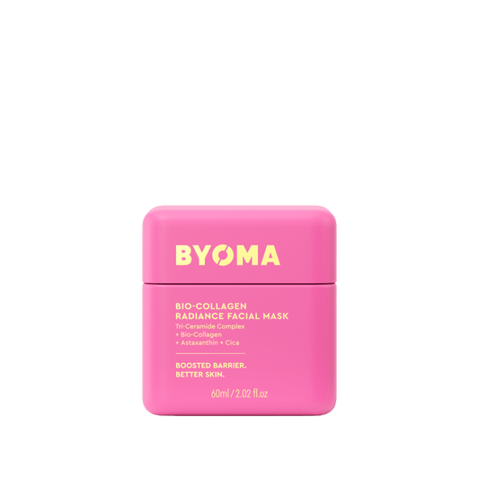 Pink facial mask container with 'BYOMA' branding on a white background